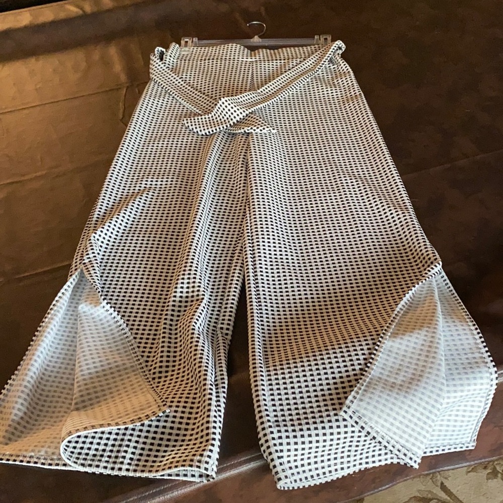 Anthropology Flowy, Wide leg pants with bottom slits.